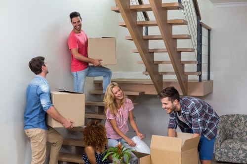 Professional house removals team preparing a home move in Osidge