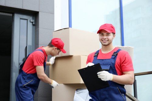 Commercial furniture and files being transported during office removals in Osidge