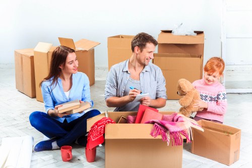 Safe furniture handling for flat removals in Osidge inside a residential building