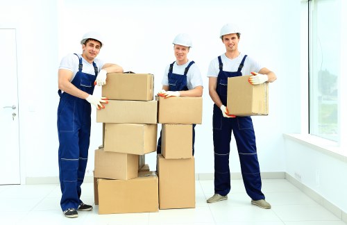 Person organizing belongings for short-term storage in Osidge