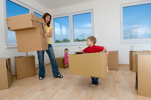 Organised packing preparation for Osidge flat removals with labelled moving boxes