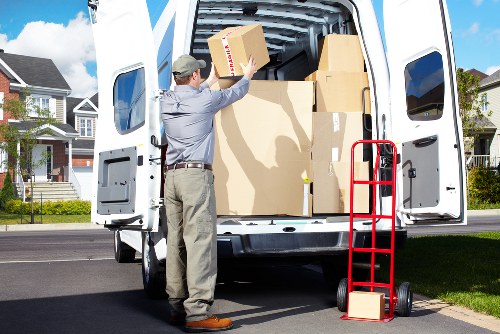 Stacked office and home furniture stored safely in Osidge